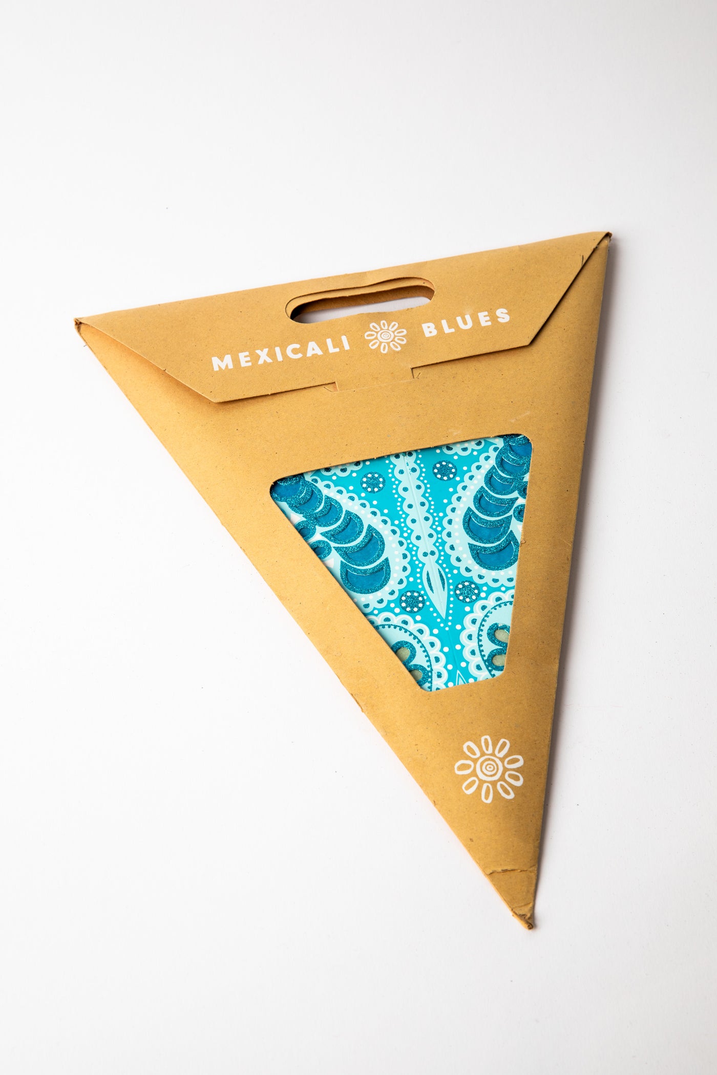 Turquoise Zari embroidered paper star, folded up, in packaging