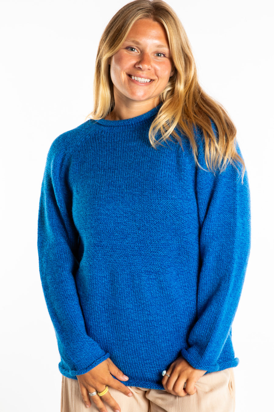 Sophie wearing a size Medium Blueberry fisherman style sweater 