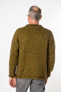 Ross is wearing size L roll neck alpaca sweater in bumblebee