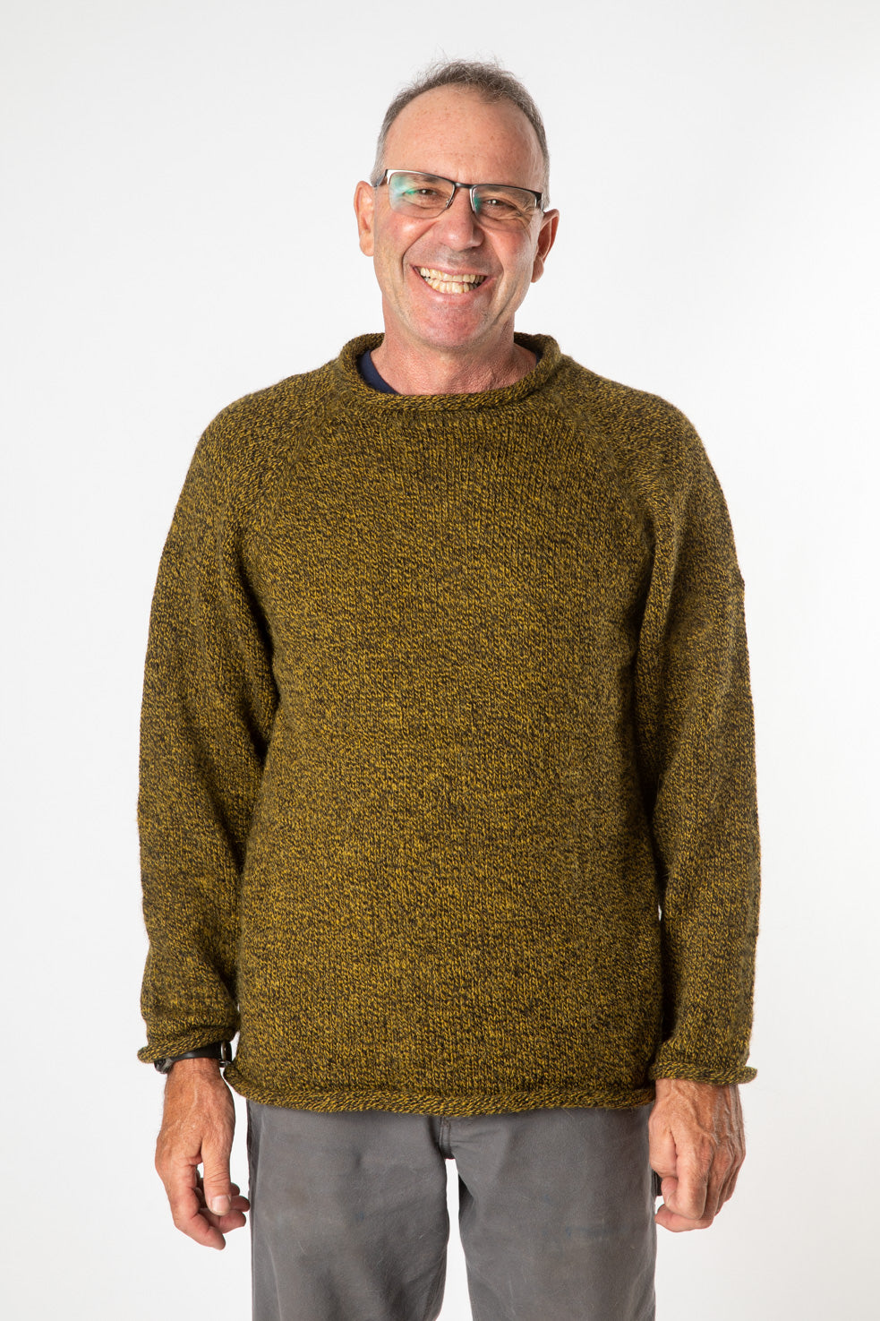 Ross is wearing size L roll neck alpaca sweater in bumblebee