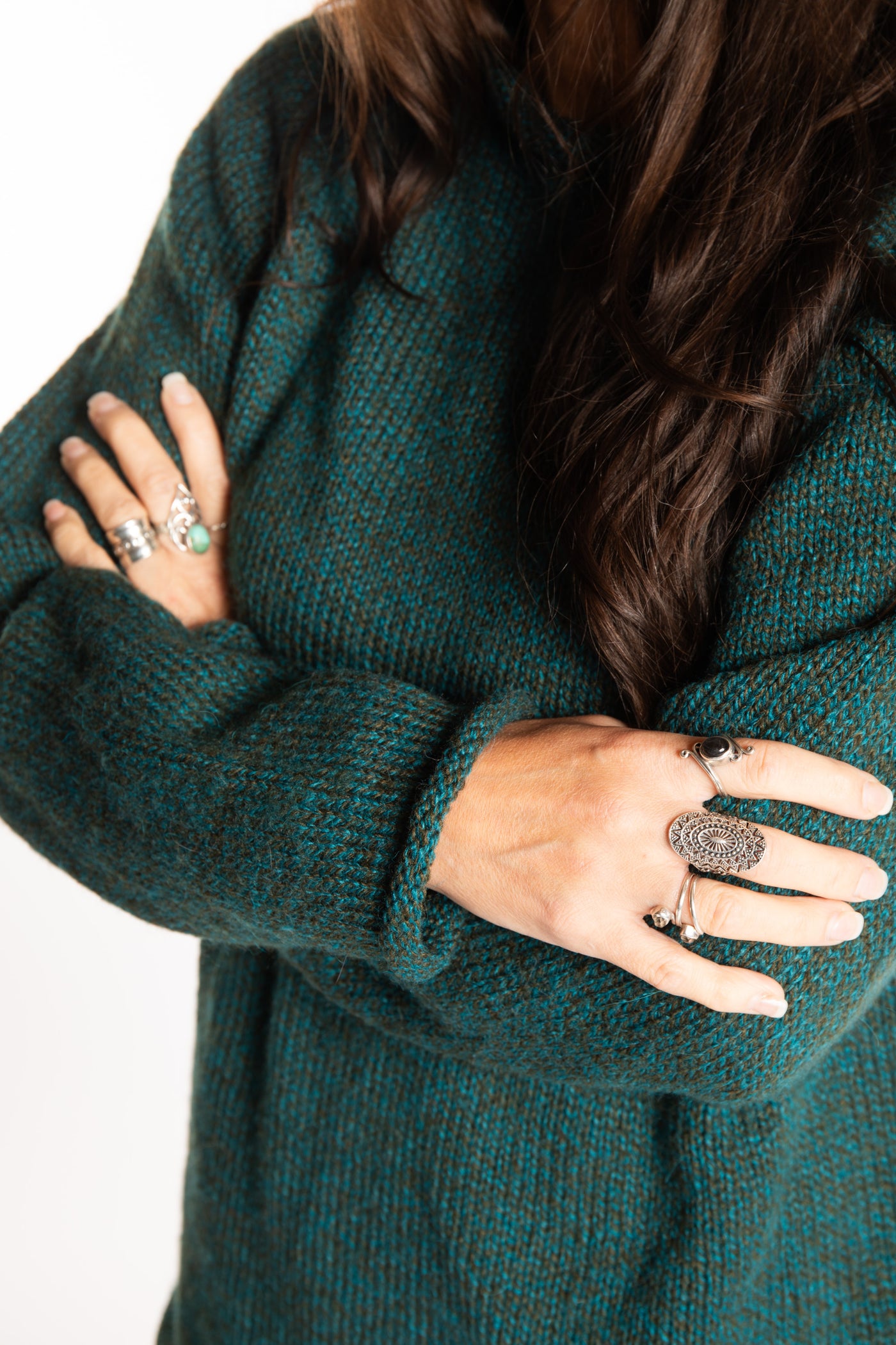 Jen wearing a size large Emerald fisherman style sweater 