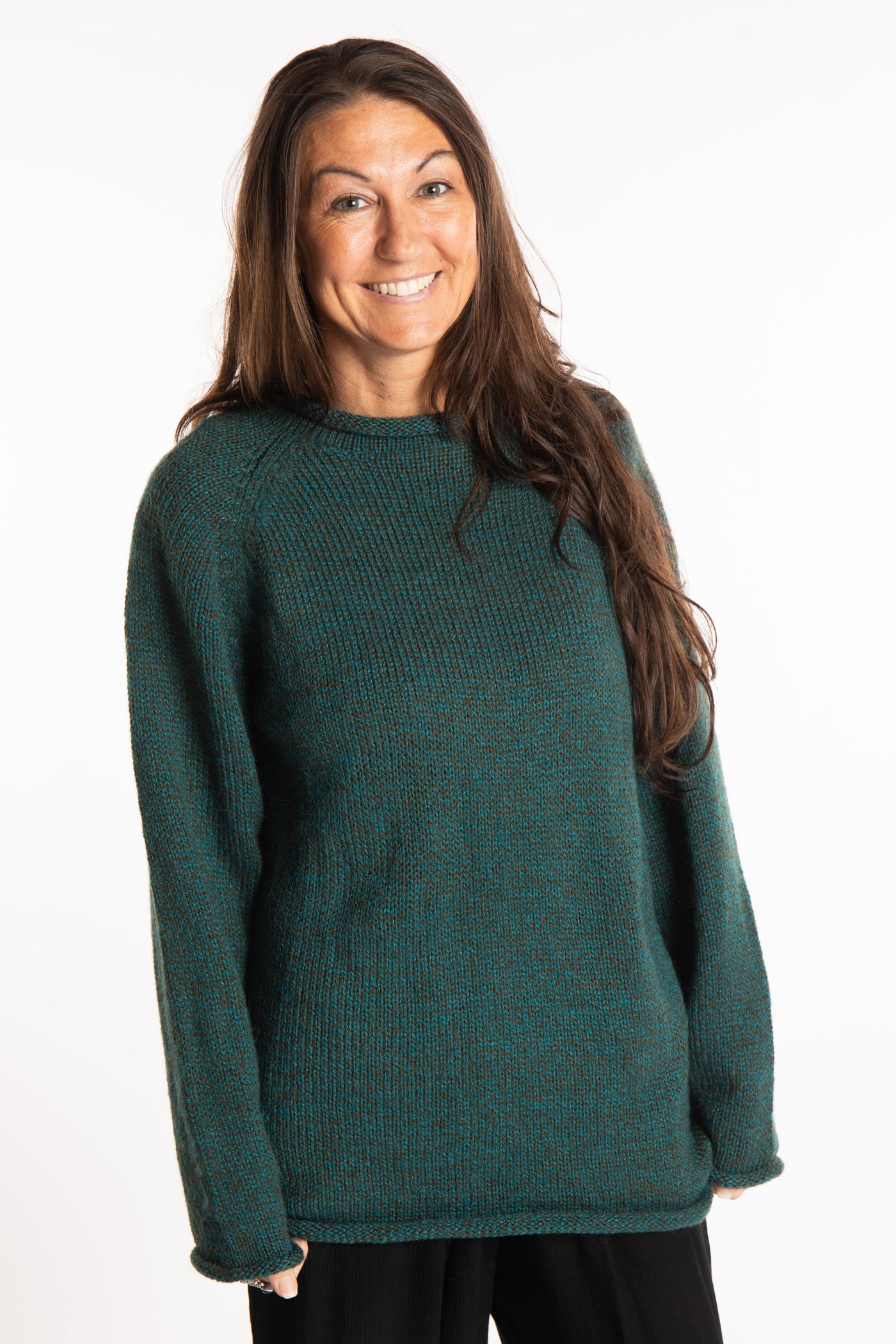 Jen wearing a size large Emerald fisherman style sweater 