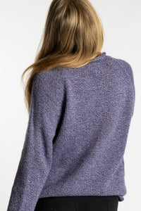 Sophie is wearing the Lilac purple Classic Unisex Alpaca Wool Sweater in size S