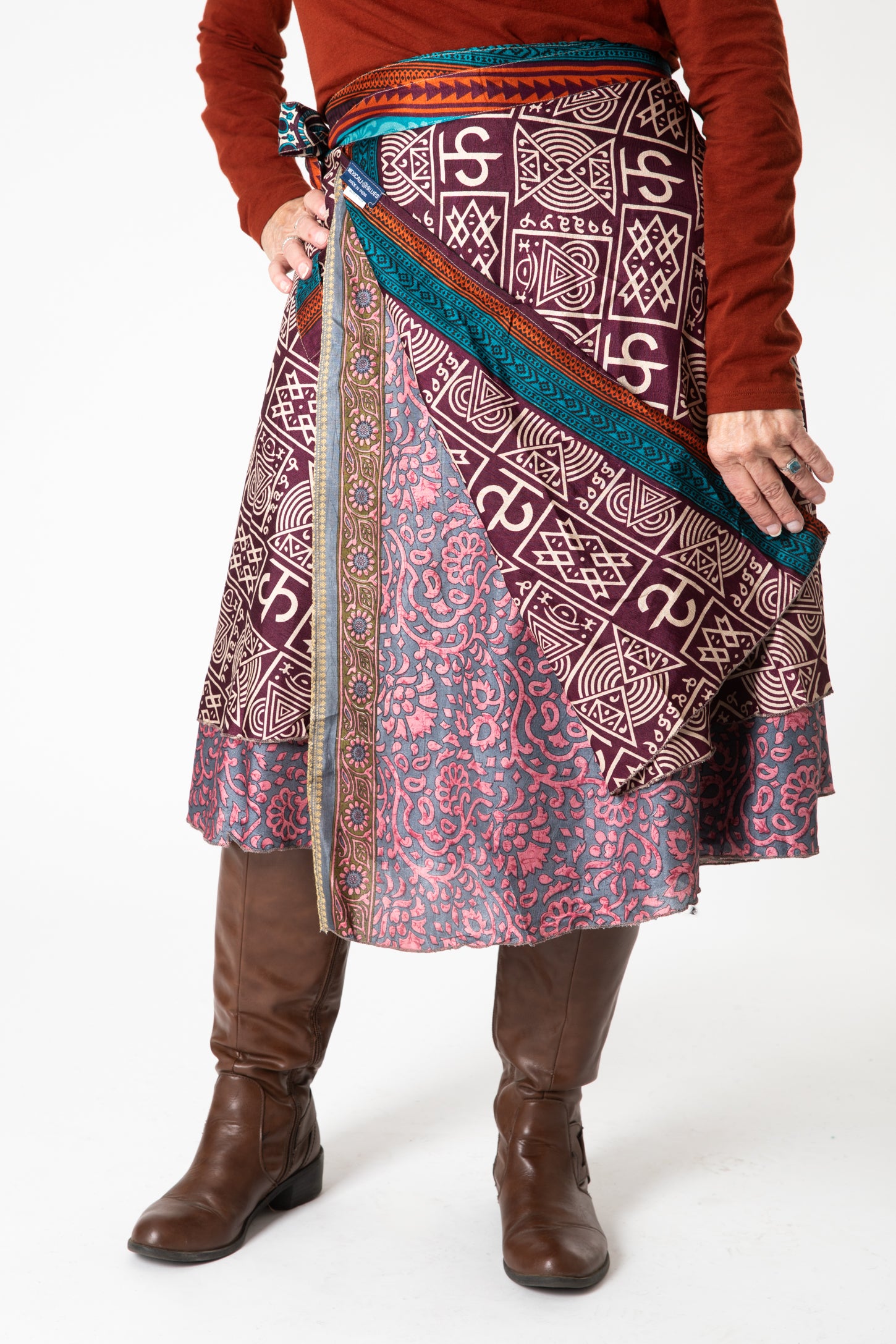 Toni is wearing a silk wrap skirt in dark star
