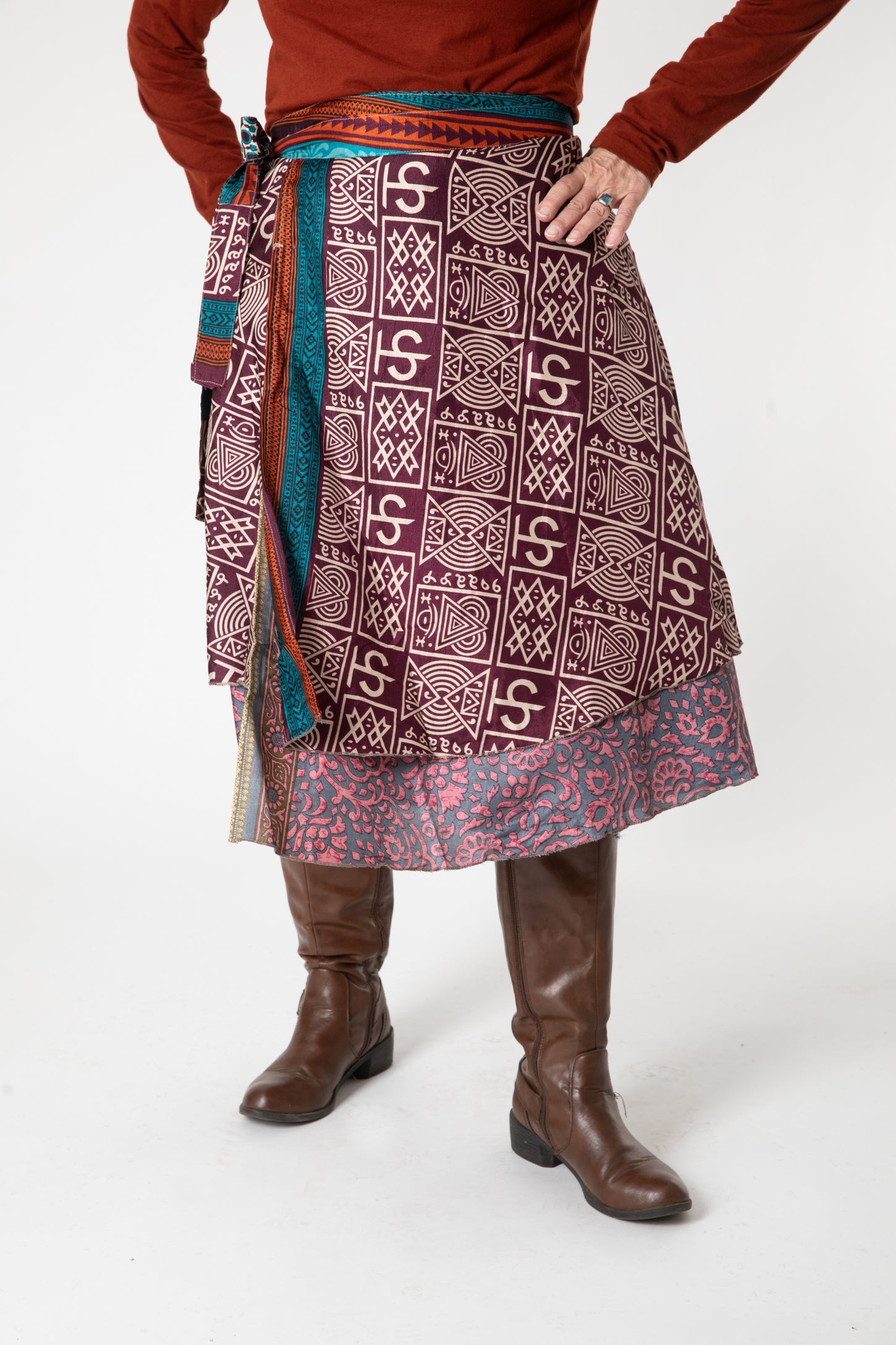 Toni is wearing a silk wrap skirt in dark star