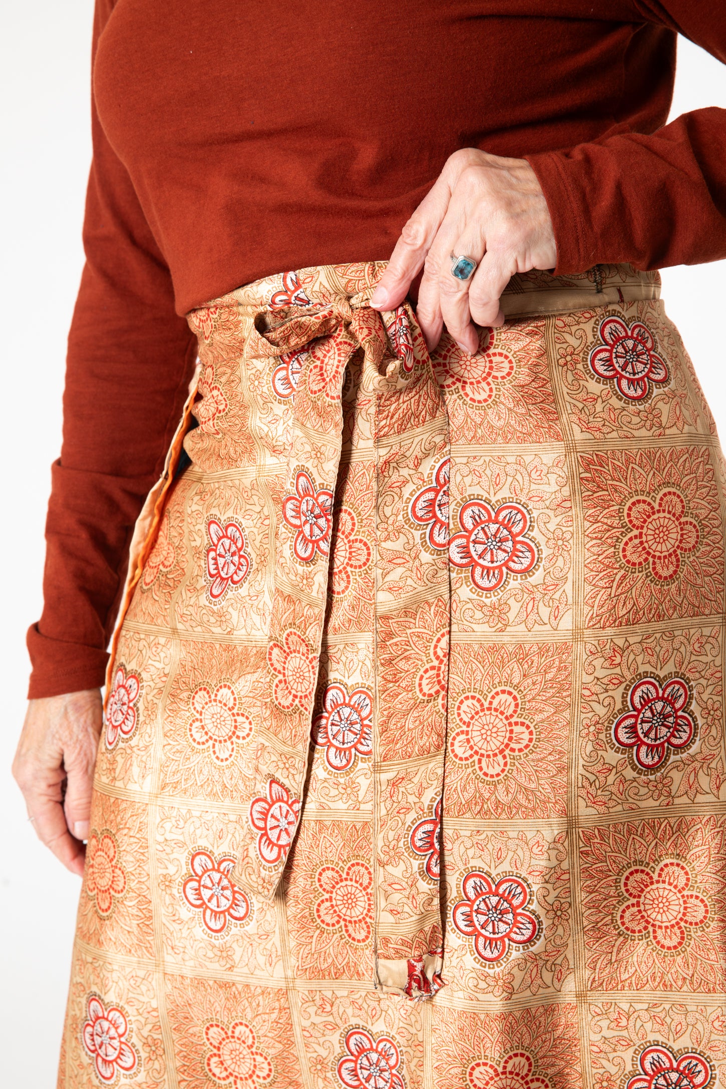 Toni is wearing a silk wrap skirt in jack straw