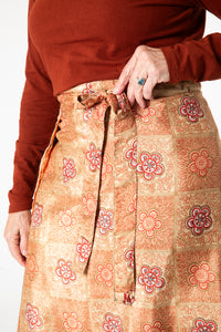 Toni is wearing a silk wrap skirt in jack straw
