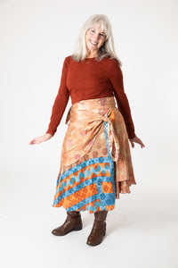 Toni is wearing a silk wrap skirt in jack straw