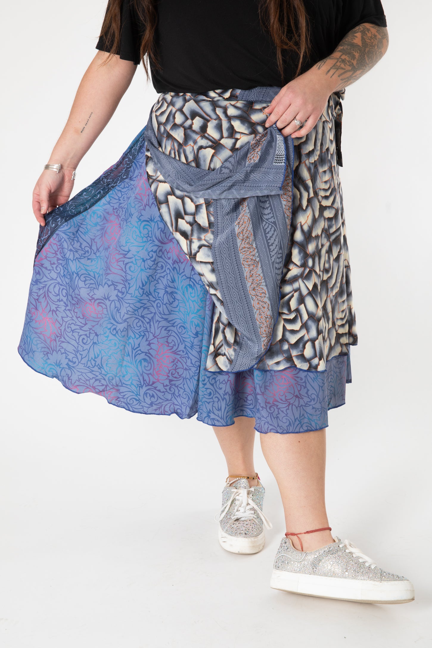 Desiree is wearing a silk wrap skirt in shakedown street