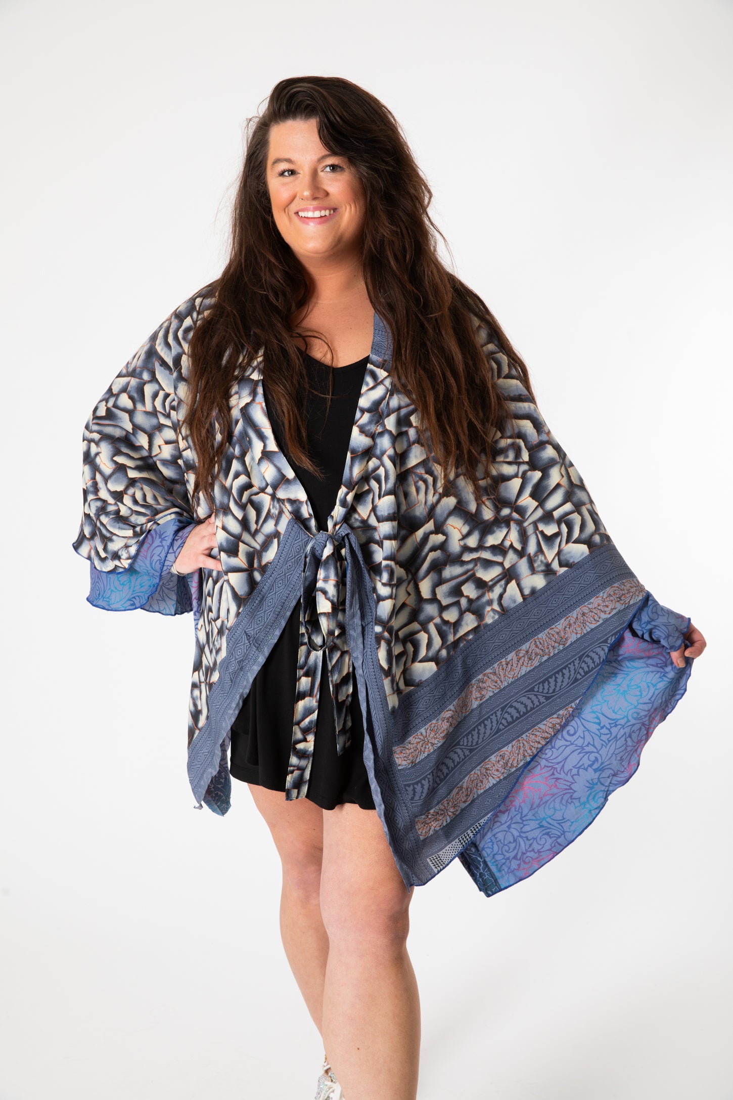 Desiree is wearing a silk wrap skirt in shakedown street
