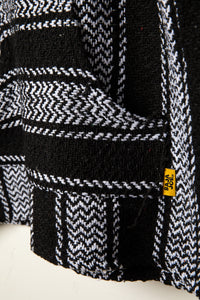 Recycled baja hoodie in Black detail of kangaroo pouch