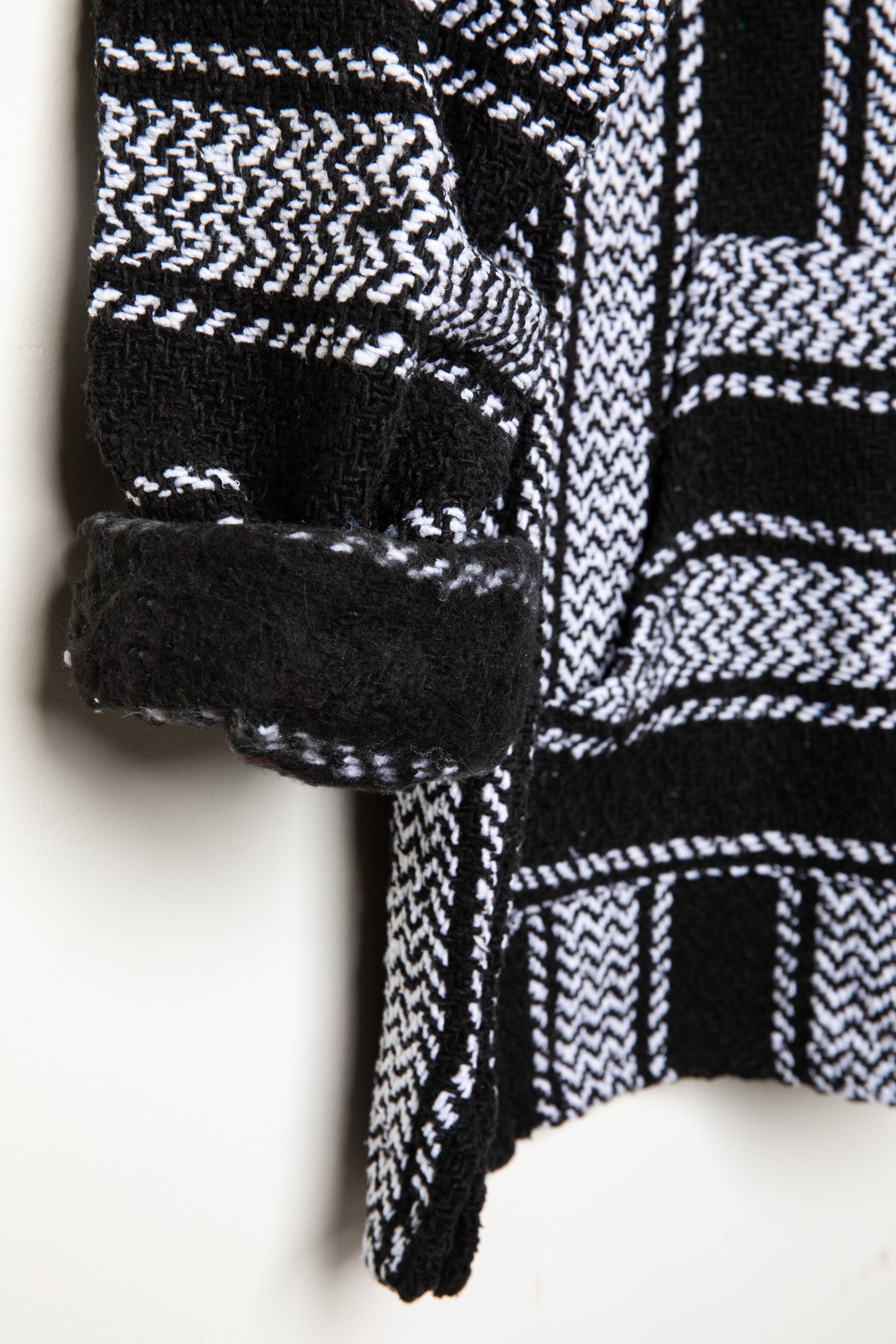 Recycled baja hoodie in Black detail of sleeve