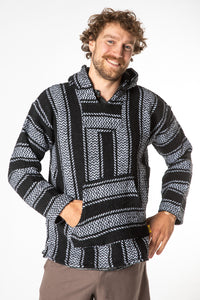 Ryan is wearing size L baja hoodie in black