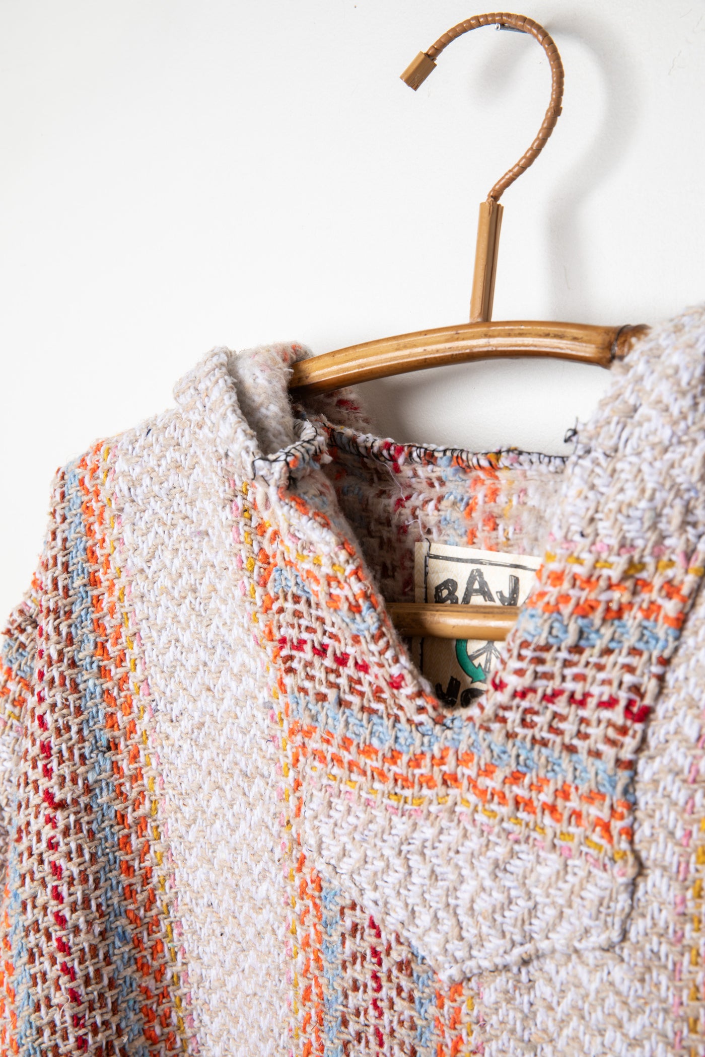 Recycled baja hoodie in Cayenne detail of neck