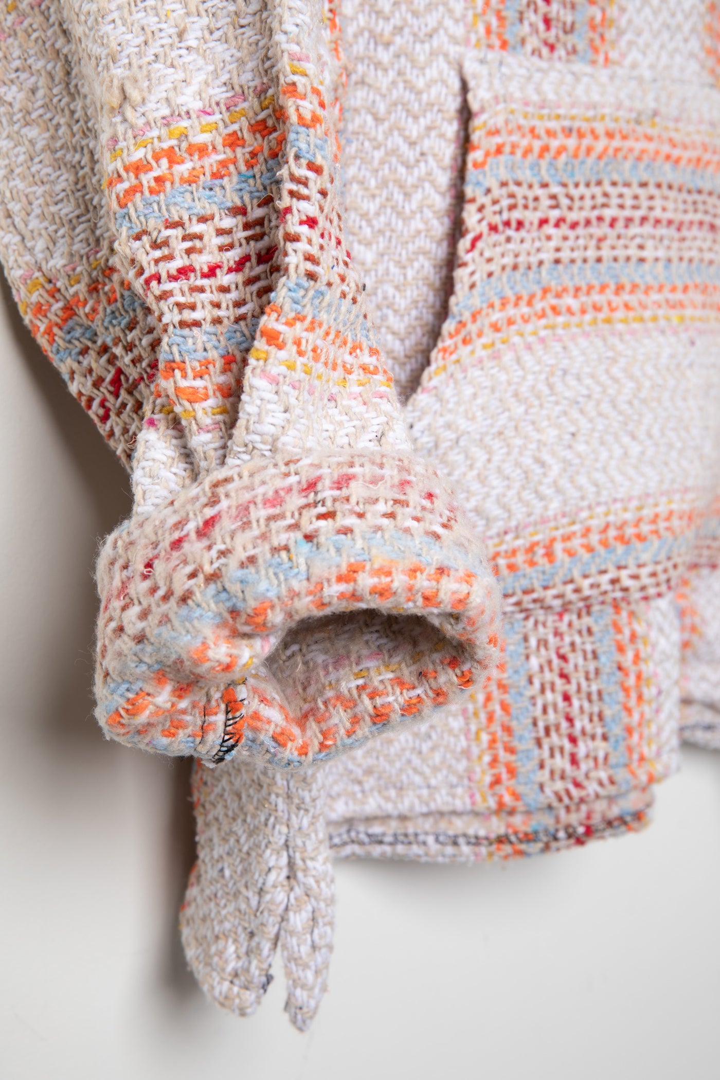 Recycled baja hoodie in Cayenne detail of sleeve