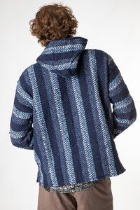 Ryan is wearing size L baja hoodie in navy
