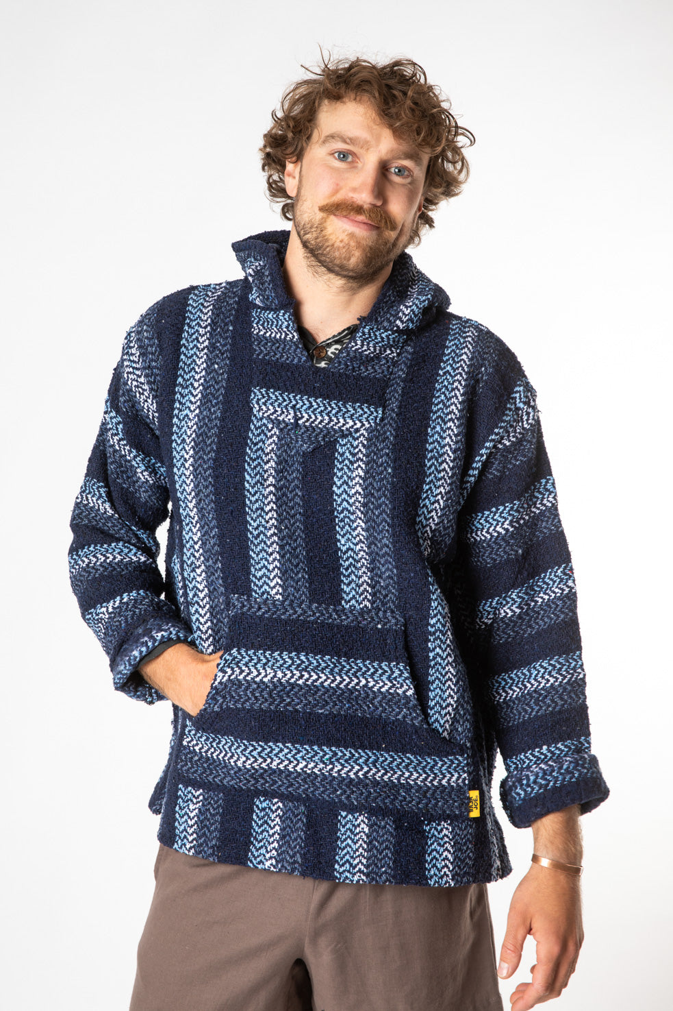 Ryan is wearing size L baja hoodie in navy