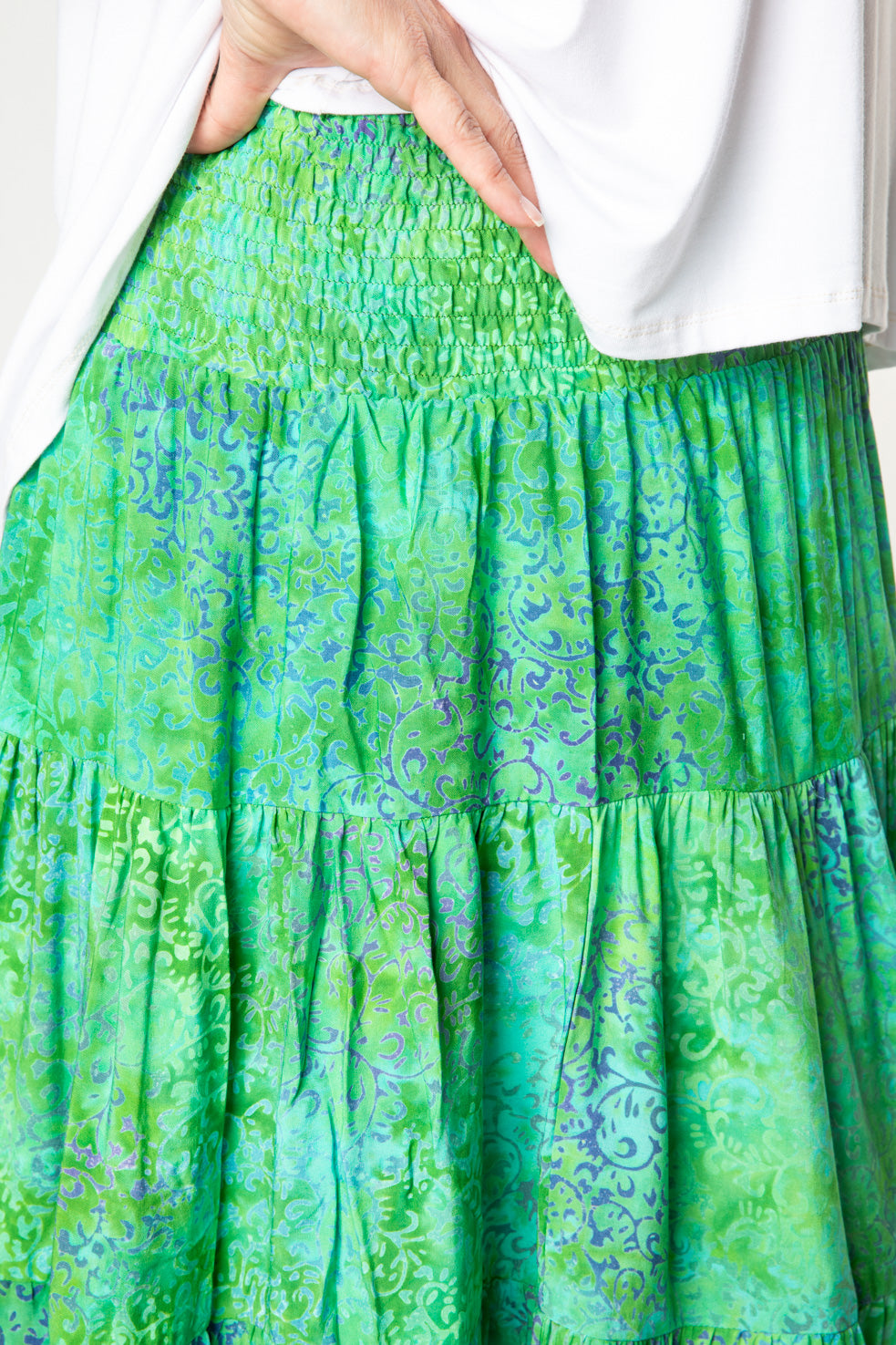 Nicole is wearing size M/L batik prairie skirt in seagreen tendrils