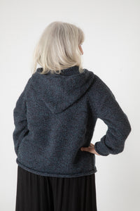 Toni is wearing size S alpaca hoodie in iceberg