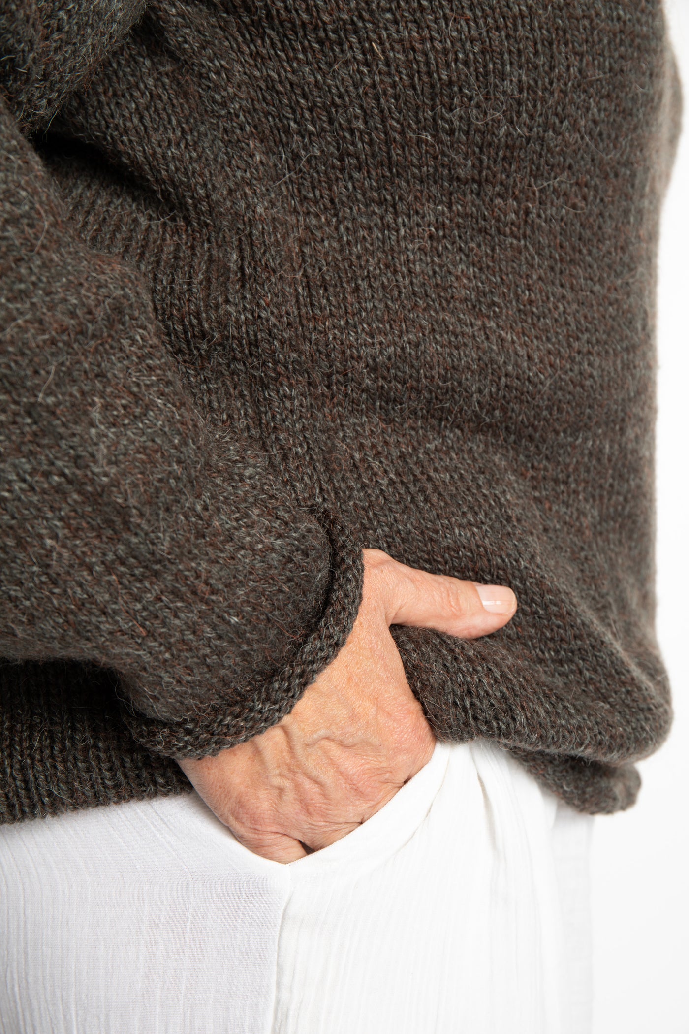 Betty wearing a size Large Ash hooded sweater