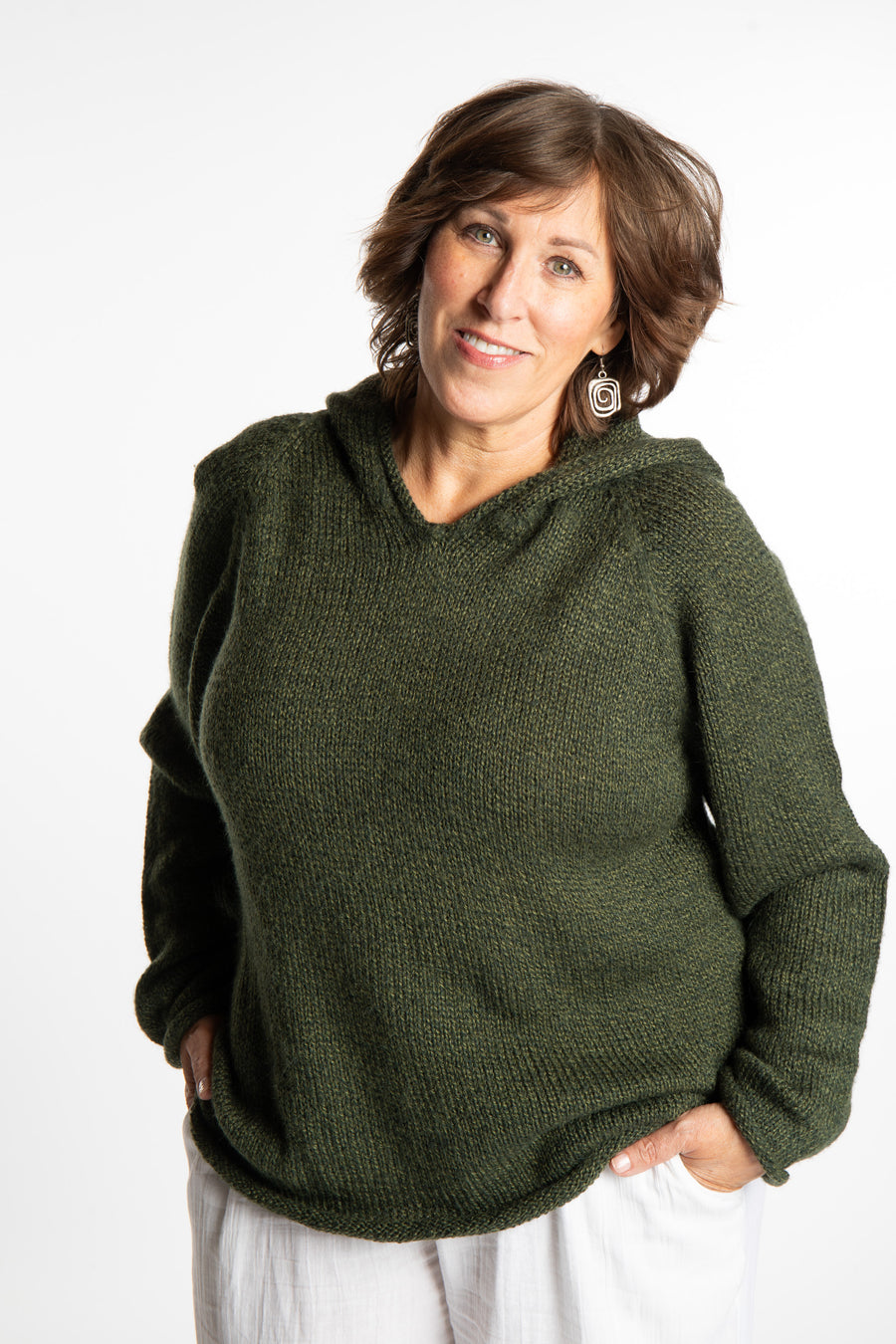 Betty wearing a size Large Pine green hooded sweater