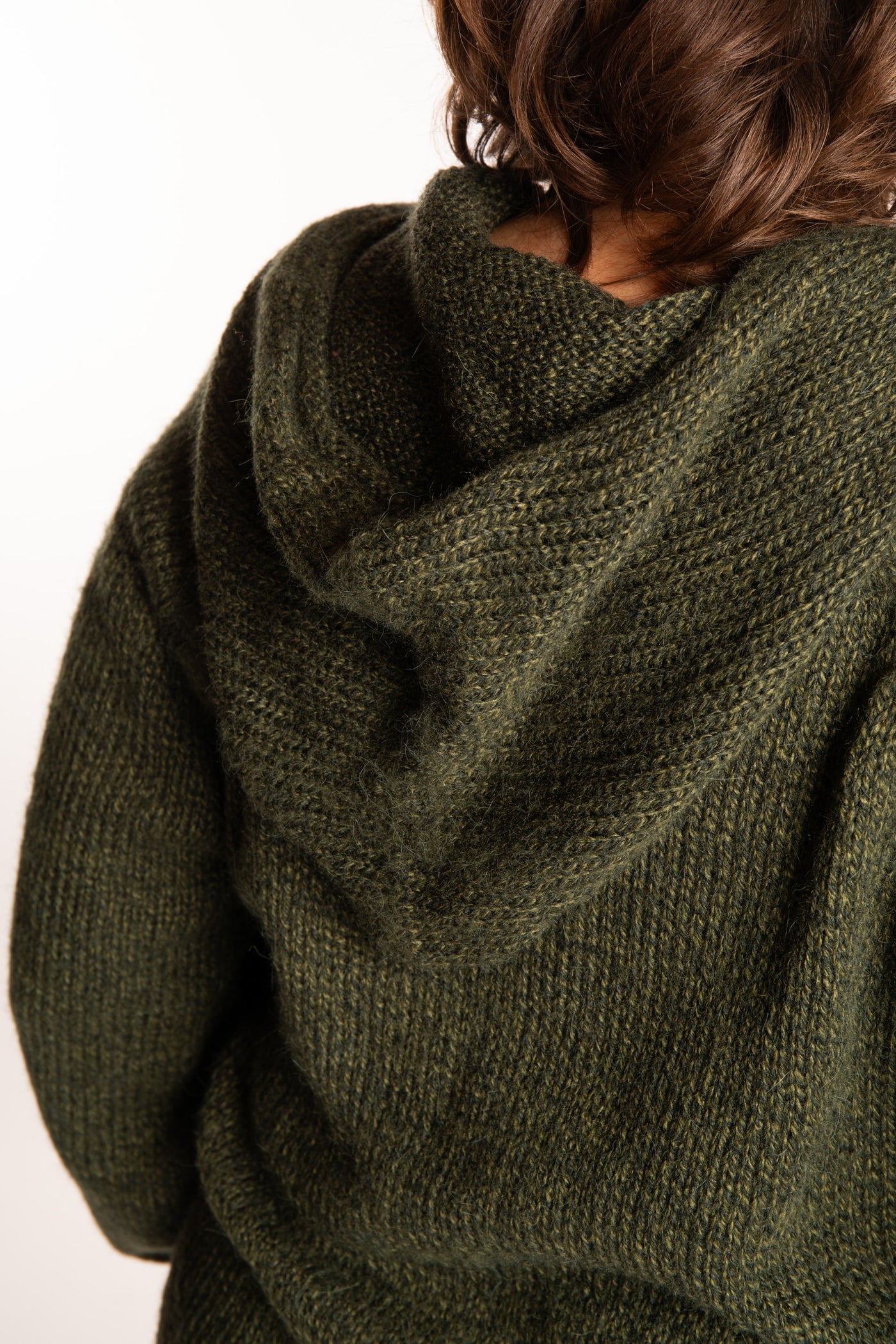 Betty wearing a size Large Pine green hooded sweater