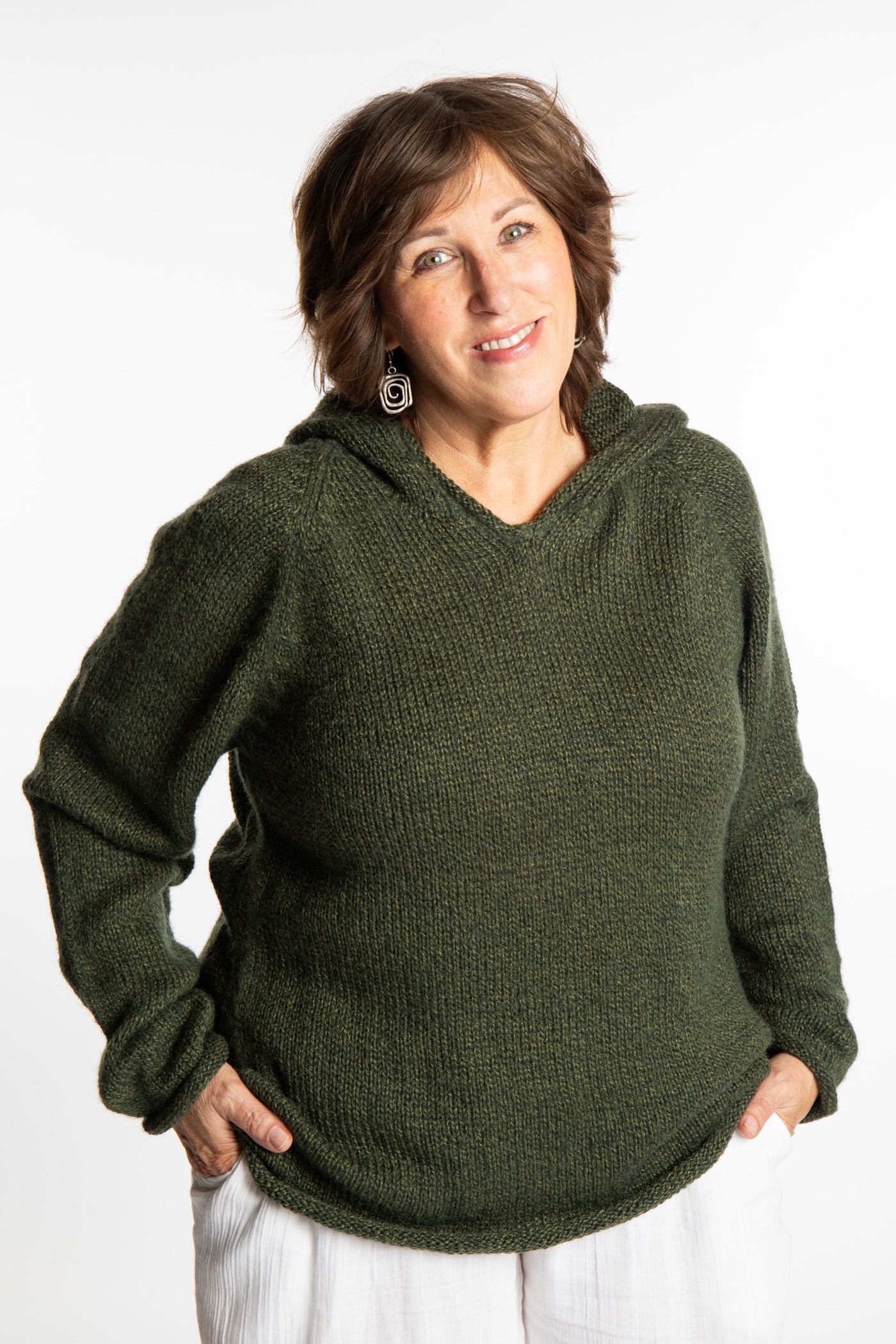 Betty wearing a size Large Pine green hooded sweater