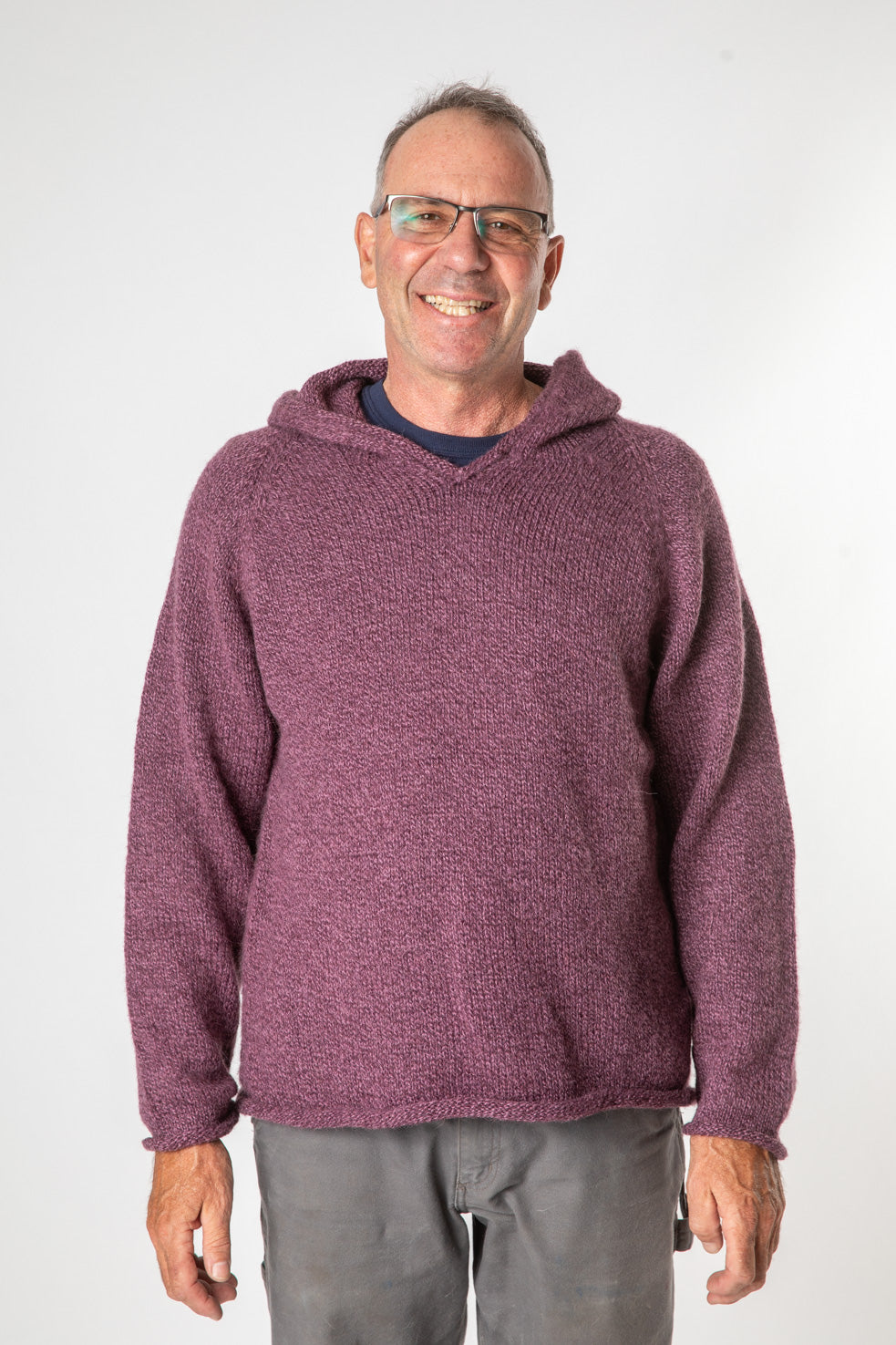 Ross is wearing size L alpaca hoodie in plum