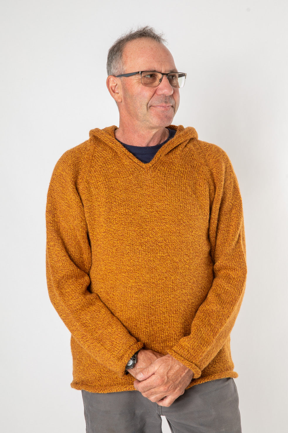 Ross is wearing size L alpaca hoodie in sunflower