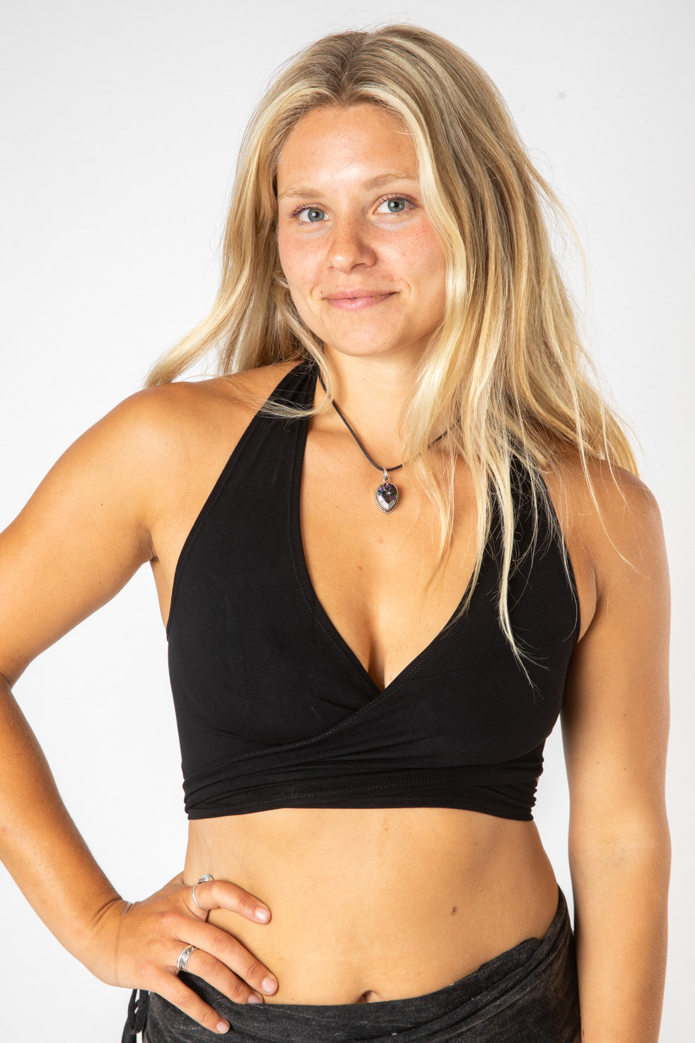 Sophie is wearing size S wrap top in black
