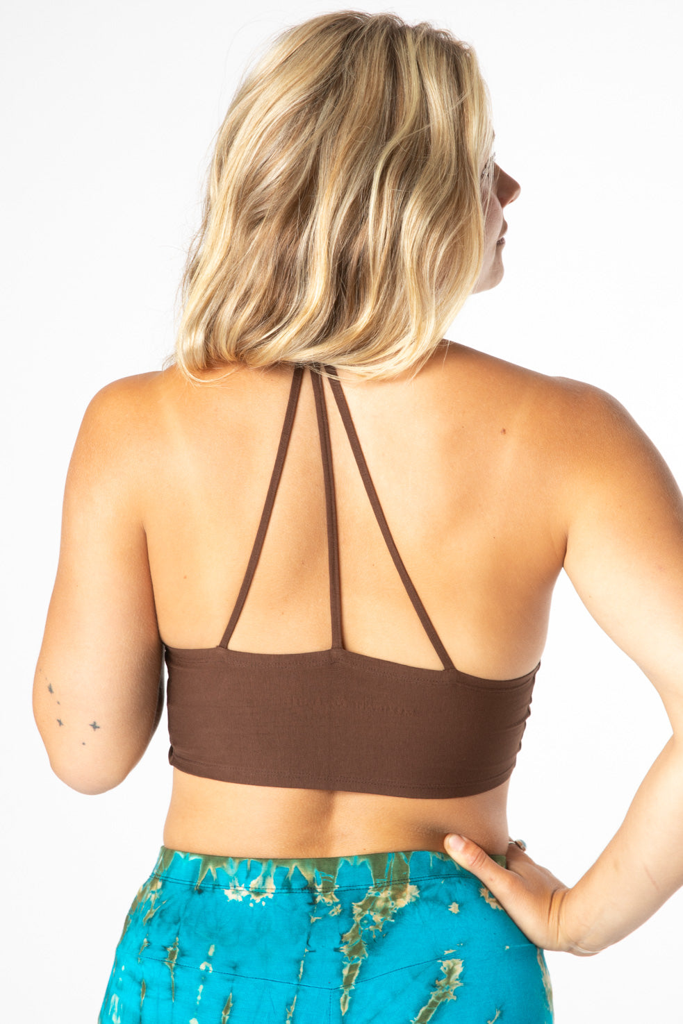 Sophie is wearing size S wrap top in dark brown