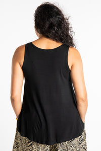 Teciane is wearing this flowy tank top in Black
