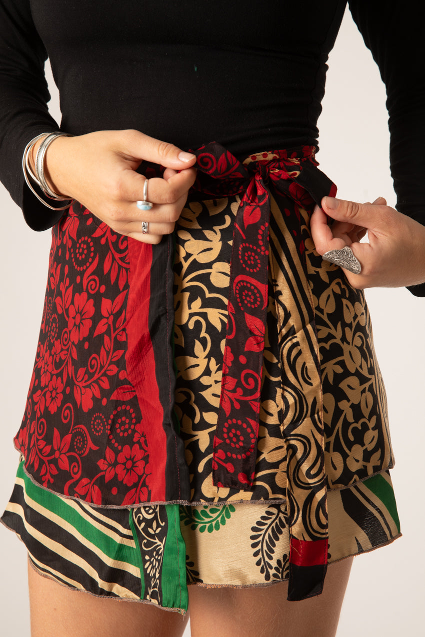 Sophie is wearing a silk wrap skirt in dark star