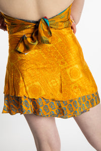 Honora is wearing a silk wrap skirt in Fire on the Mountain