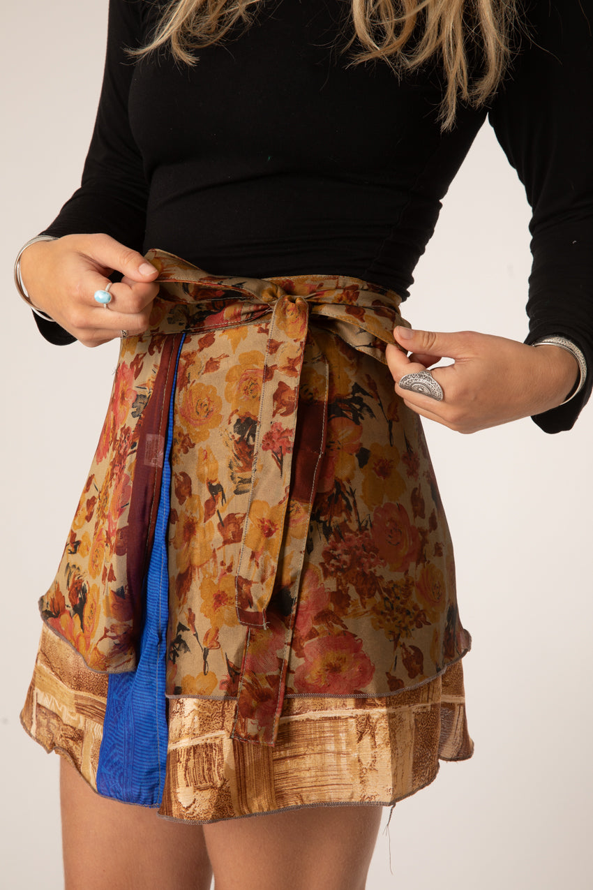 Sophie is wearing a silk wrap skirt in jack straw
