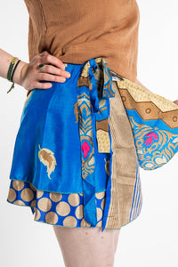 Honora is wearing a silk wrap skirt in Morning Dew