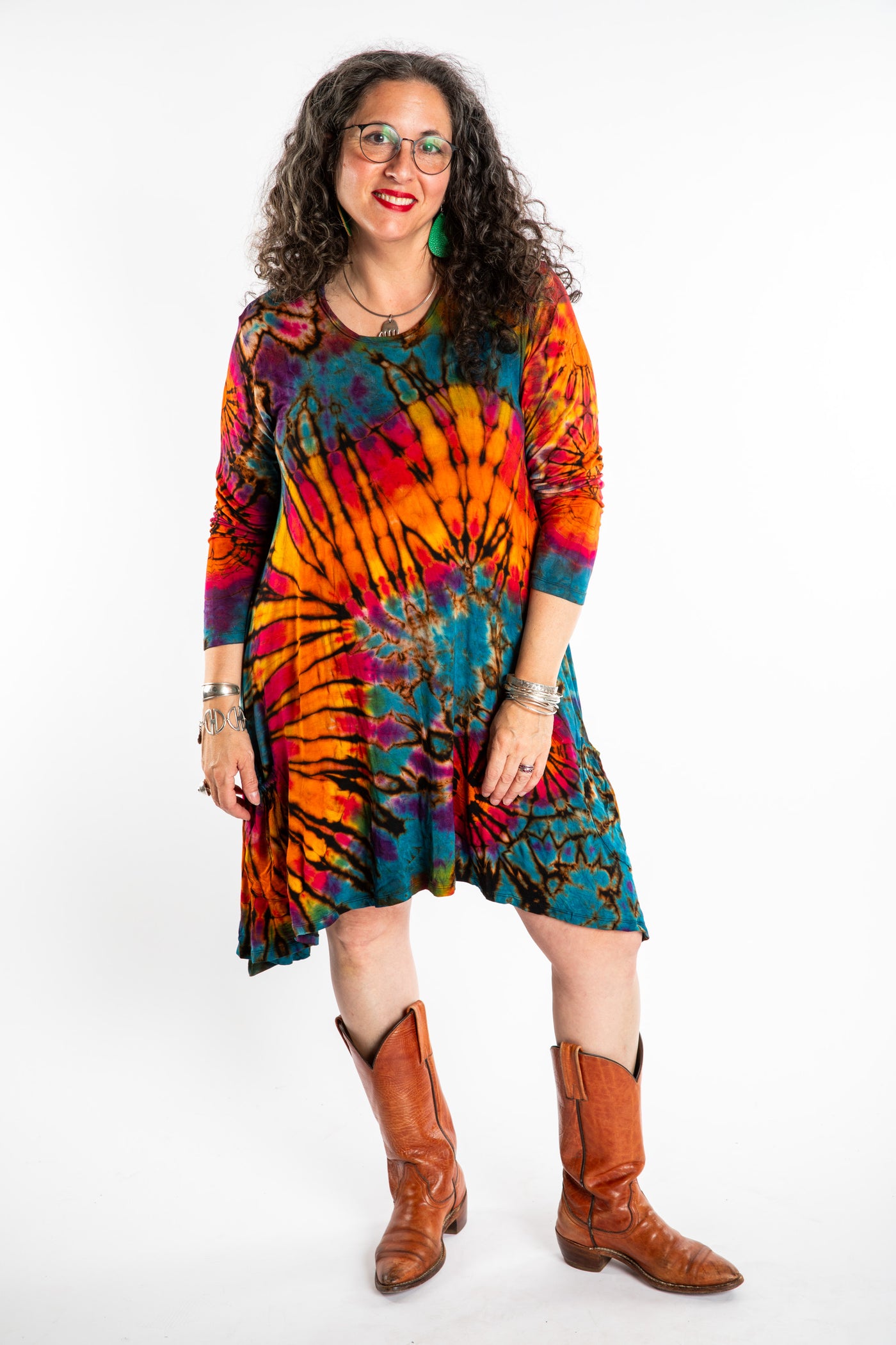Susan wearing a orange long sleeve tie dye dress in the color Ocean
