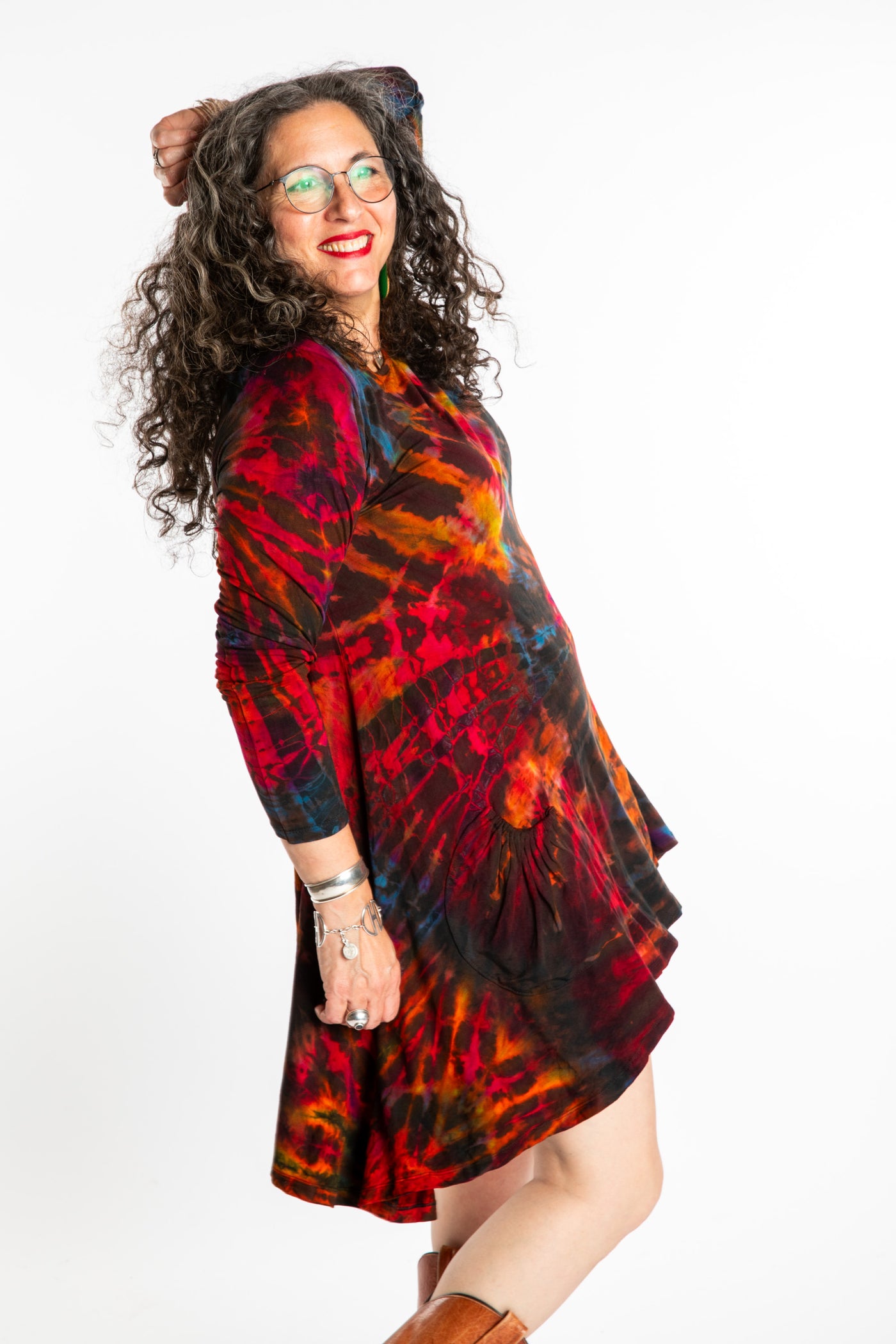 Susan wearing a long sleeve tie dye dress in the color Brown