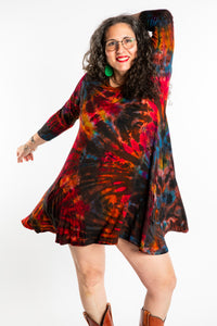 Susan wearing a long sleeve tie dye dress in the color Brown