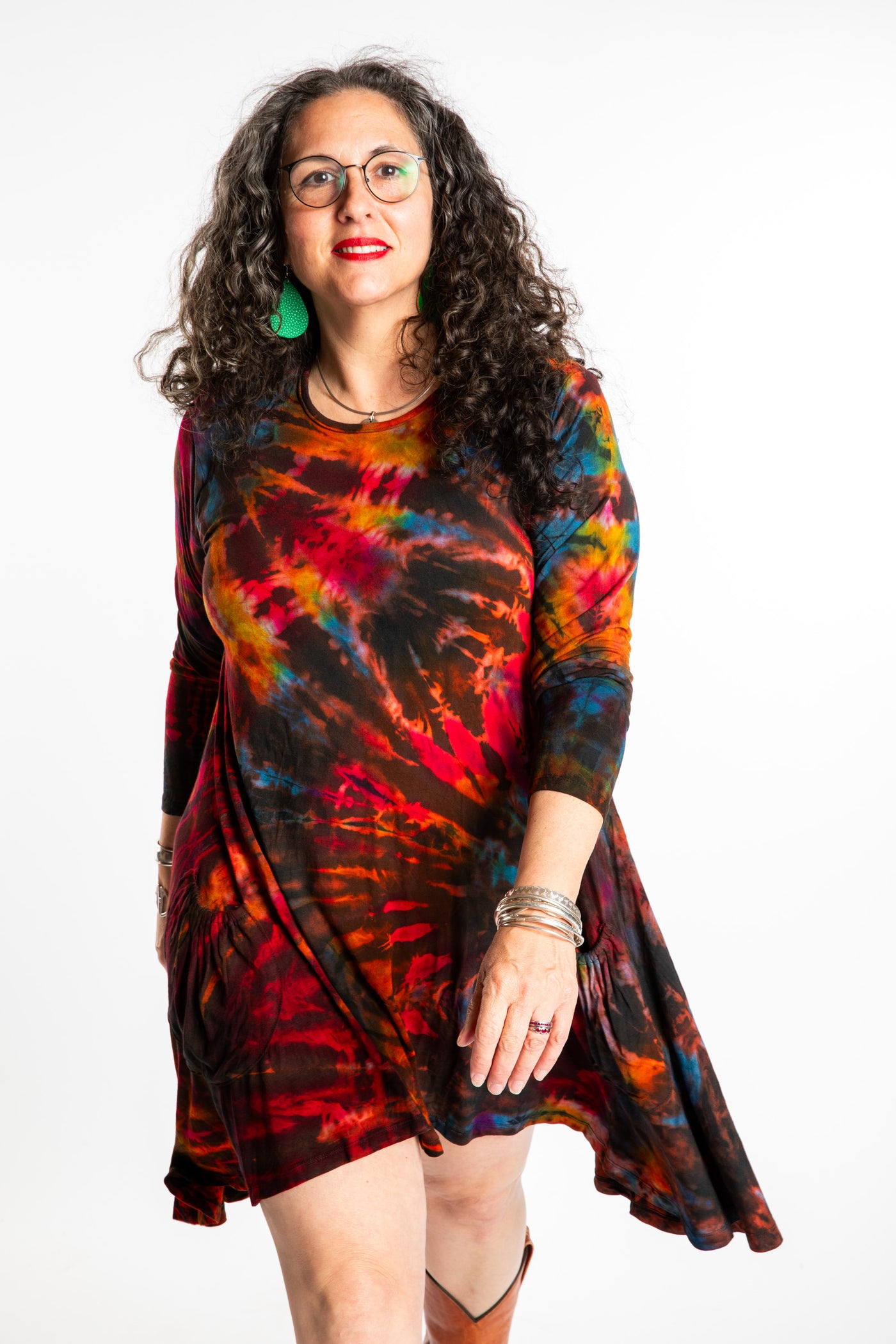 Susan wearing a long sleeve tie dye dress in the color Brown