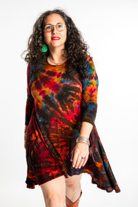 Susan wearing a long sleeve tie dye dress in the color Brown