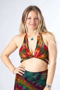 Sophie is wearing a tie dye wrap top in green 