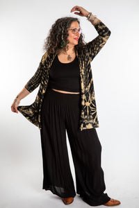 Susan wearing a black and white mudmee tie dye cardigan