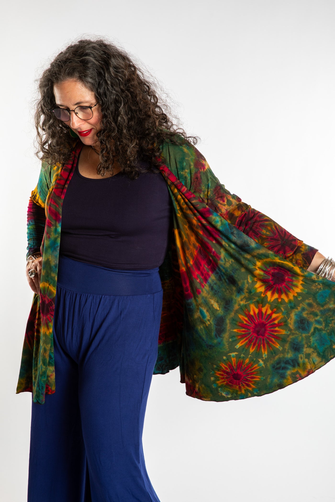 Susan wearing a green mudmee tie dye cardigan