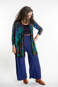 Susan wearing a blue ocean mudmee tie dye cardigan
