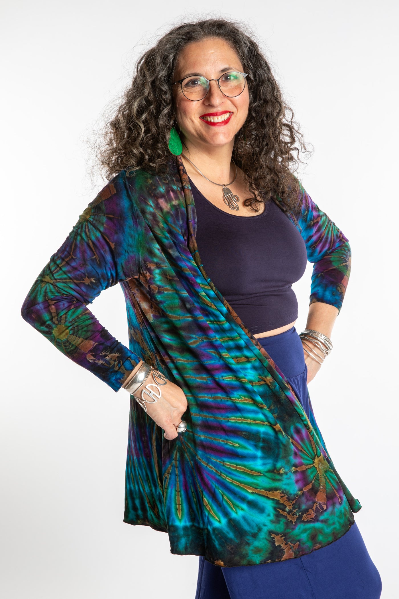 Susan wearing a blue ocean mudmee tie dye cardigan