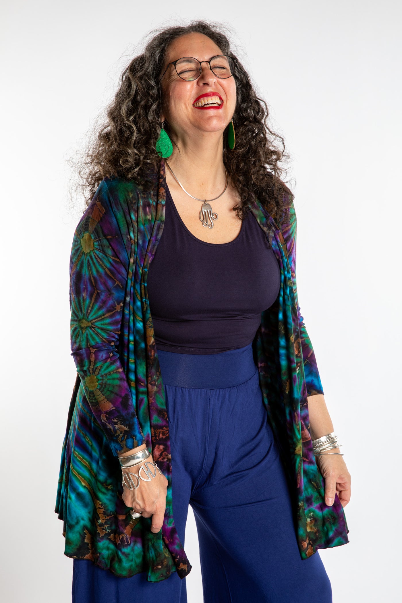 Susan wearing a blue ocean mudmee tie dye cardigan