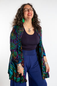 Susan wearing a blue ocean mudmee tie dye cardigan