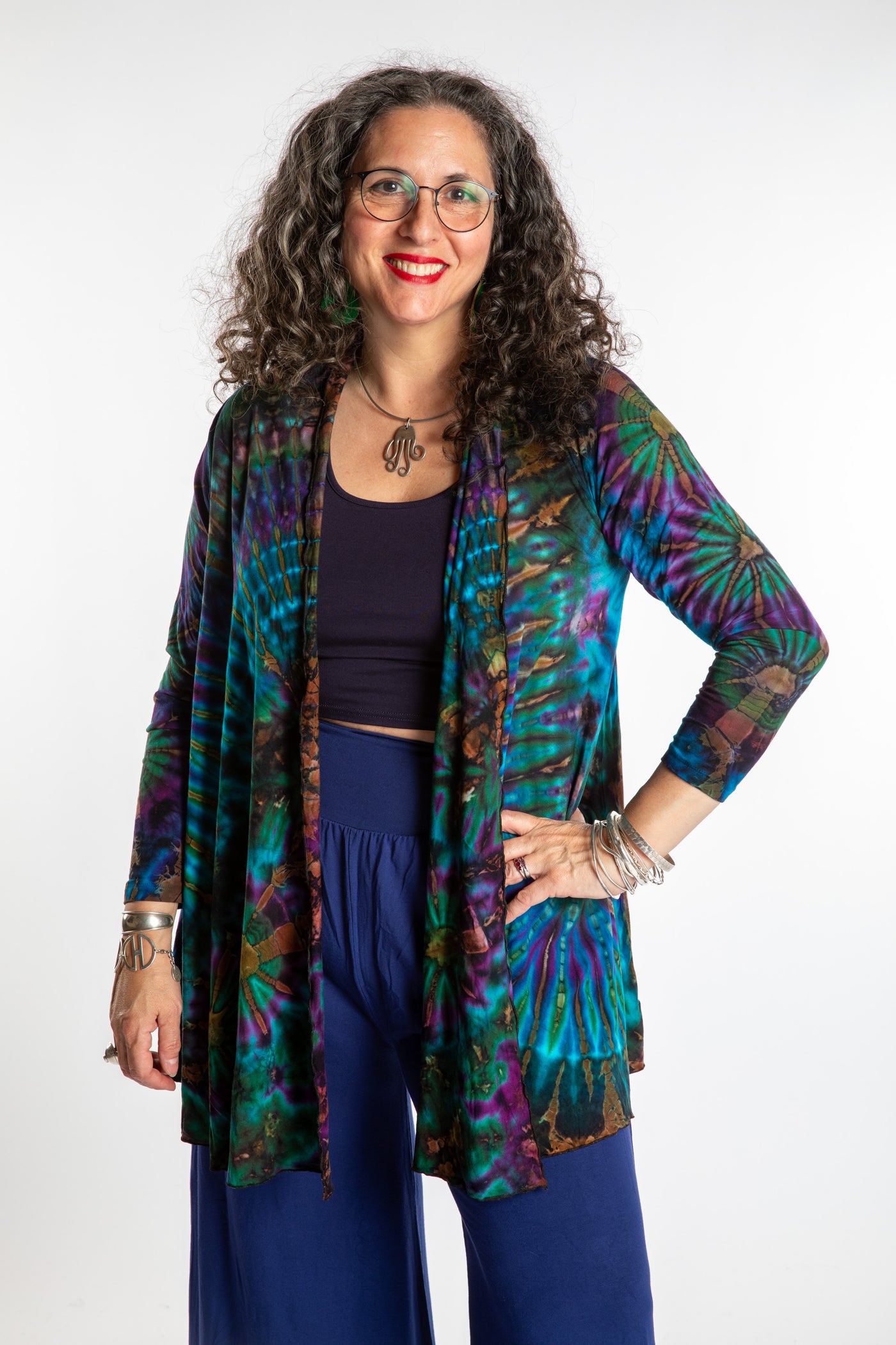 Susan wearing a blue ocean mudmee tie dye cardigan