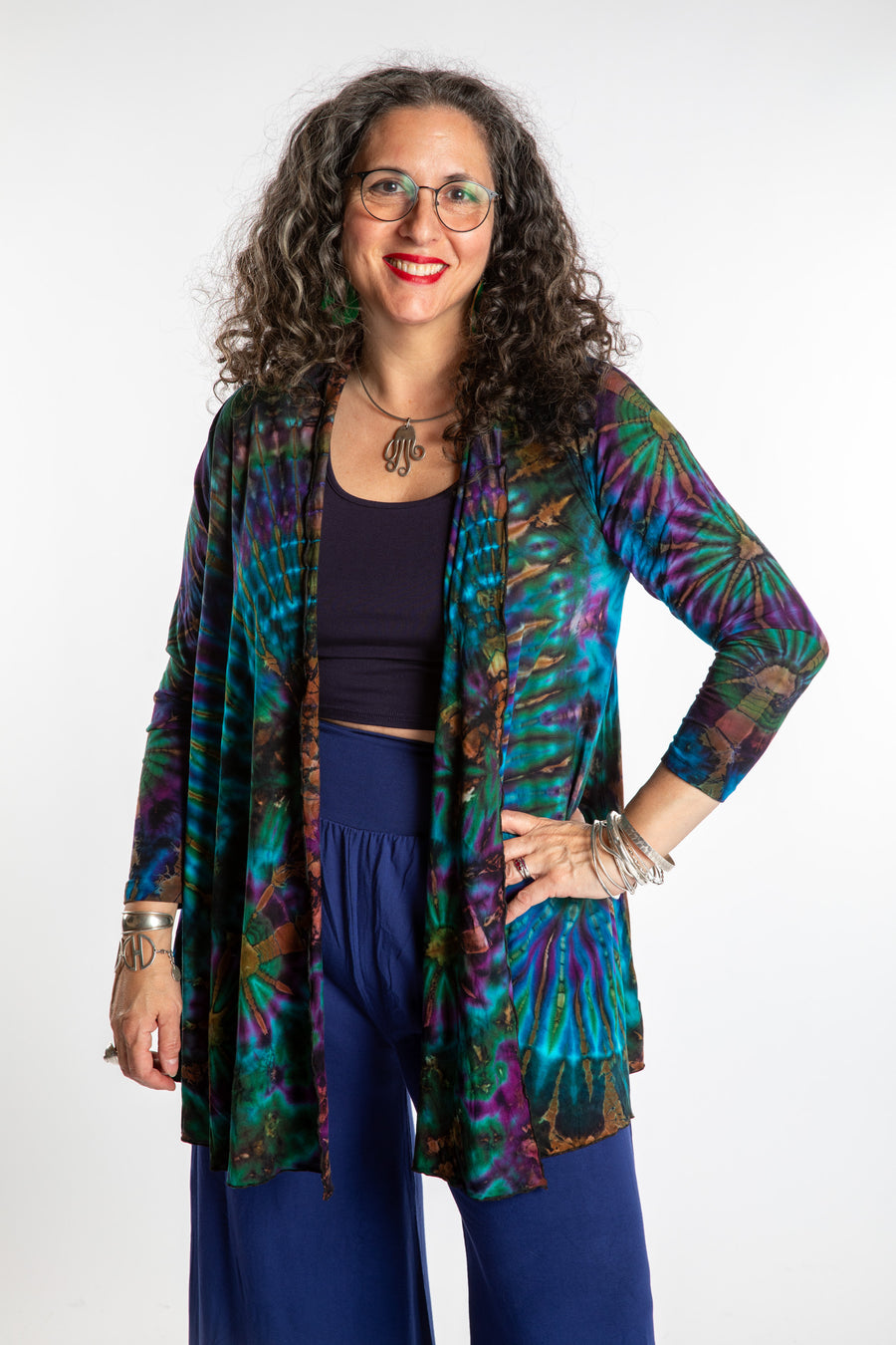 Susan wearing a blue ocean mudmee tie dye cardigan